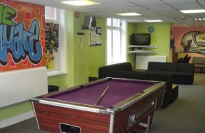 Photo of a pool table in the Square Youth Cafe