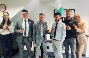 Photo of Town Mayor Cllr Paul Holbrook with Stevens & Carter staff and guests at their 'World's Biggest Coffee Morning' fundraising event for Macmillan Cancer Care