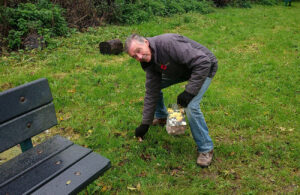 Photo of Mayor Cllr Paul Holbrook planting spring bulbs at Orchard Park - November 2022