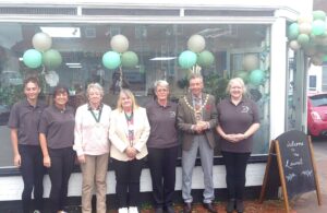 Photo of staff, Mayor's Consort Barbara Holbrook, Deputy Mayor Anne Marie Ricketts ad Mayor Paul Holbrook at the opening of The Laurel Cafe in Market Square - 19 September 2023