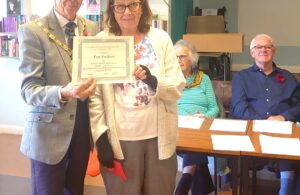 Photo of Mayor Cllr Pauol Holbrook presenting certificates at the Charles Hunt Centre AGM and Volunteer Awards Ceremony - 6th November 2023