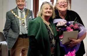 Photo of Christine Holverson with the Mayor and Deputy Cllr Paul Holbrook and Anne Marie Ricketts