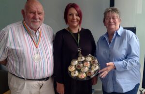 Photo of Cllr Colin Mitchell, Post Office Manager Steph Stephens and Cllr Mary Laxton