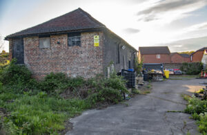 Photo of the Grovelands Barn site, maintained by the Town Council
