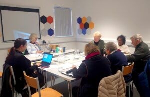 Photo of a meeting in progress at the James West Community Centre