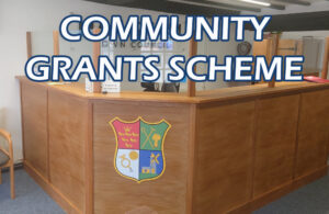 Photo of the Hailsham Town Council public enquiries desk with overlapping text reading 'Community Grants Scheme'