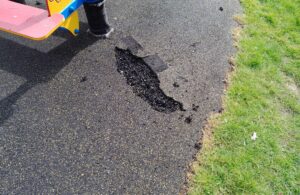 Photo of vandalism to the wet-pour surface at the Western Road children's play area